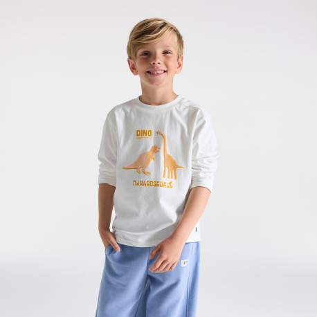 Okaidi Μπλούζα μακρυμάνικη με μοτίφ δεινόσαυρο, λευκή για αγόρια